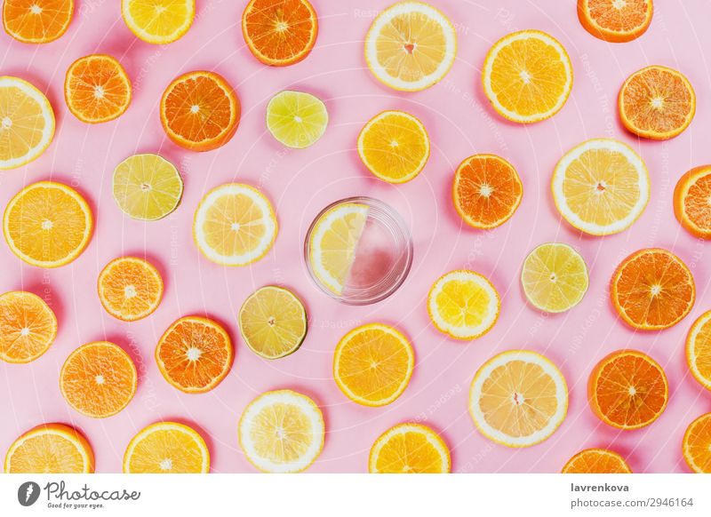 lemon water with various sliced citrus fruits Citrus fruits Cut Diet flat lay Food Healthy Eating Dish Fresh Fruit Hand Lemon Lime Orange Organic Pink Mature