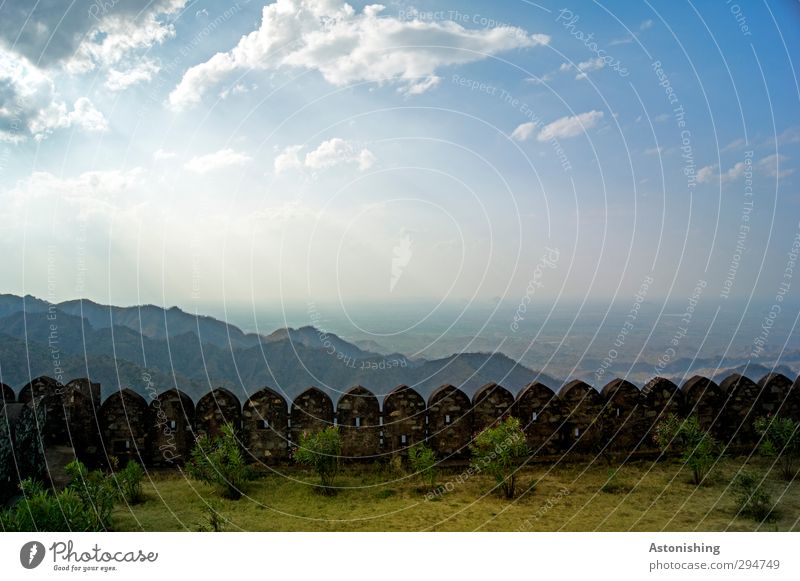 above the battlements Environment Nature Landscape Plant Air Sky Clouds Horizon Sunlight Spring Weather Beautiful weather Warmth Grass Bushes Meadow Hill Rock