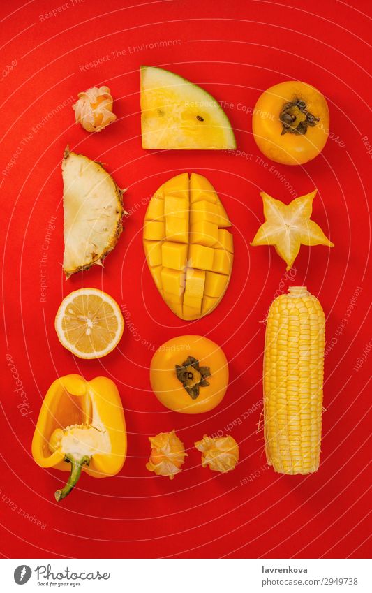 various yellow and orange fruits and vegetables on red Mango Fruit Red flat lay Pepper bell Corny Lemon Citrus fruits Fresh Healthy Healthy Eating persimmon
