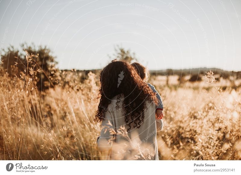 Mother walking with daughter through the fields Lifestyle Summer Summer vacation Human being Feminine Child Baby Toddler Girl Adults 2 1 - 3 years 18 - 30 years