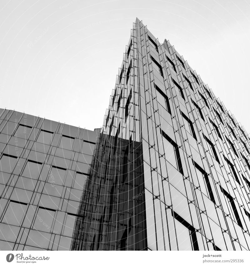 Glass facade self-reflecting square Glas facade Sharp-edged Modern Cliche Gloomy Quality Corner Boundary Black & white photo Abstract Structures and shapes