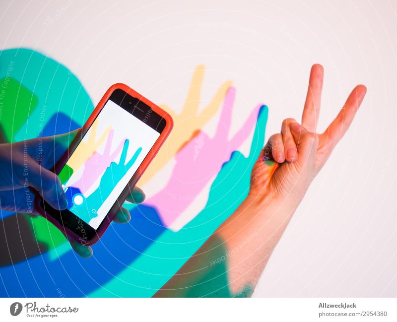 two finger gesture Peace Hand Gesture two fingers Multicoloured Yellow Magenta Cyan Salutation two beers Hare & Rabbit & Bunny Neutral Background Isolated Image