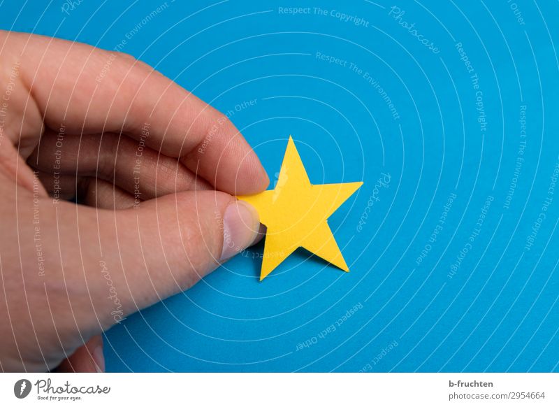 yellow star Man Adults Hand Fingers Paper Decoration Sign Select Touch Movement To hold on Blue Yellow Idyll Uniqueness Inspiration Star (Symbol) 1