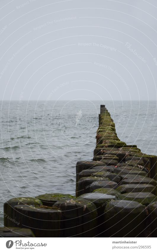 paving piles Ocean Waves Nature Water Sky Clouds Horizon Spring Autumn Bad weather Coast Bay Baltic Sea Wooden stake Footbridge Breathe Think To enjoy Looking