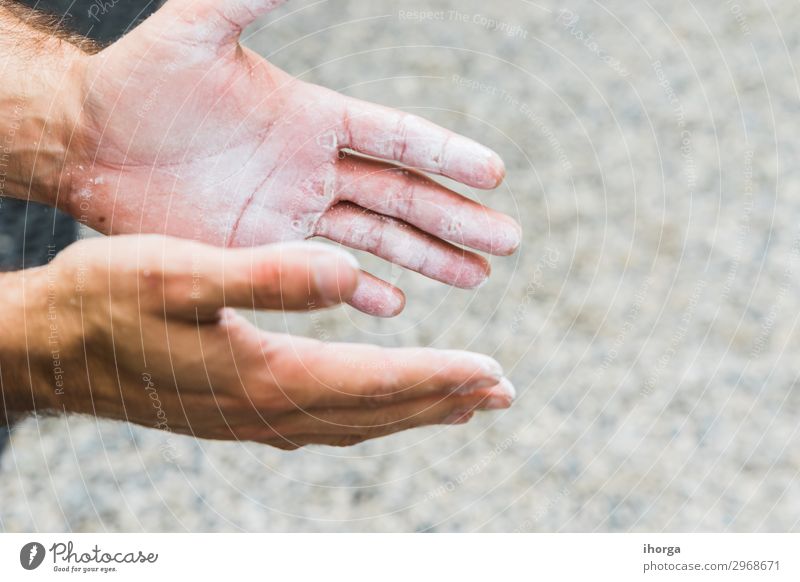 Hands of Man practicing rock climbing. Lifestyle Joy Leisure and hobbies Sports Climbing Mountaineering Fingers Rock Fitness Hang Strong Black Power Concentrate