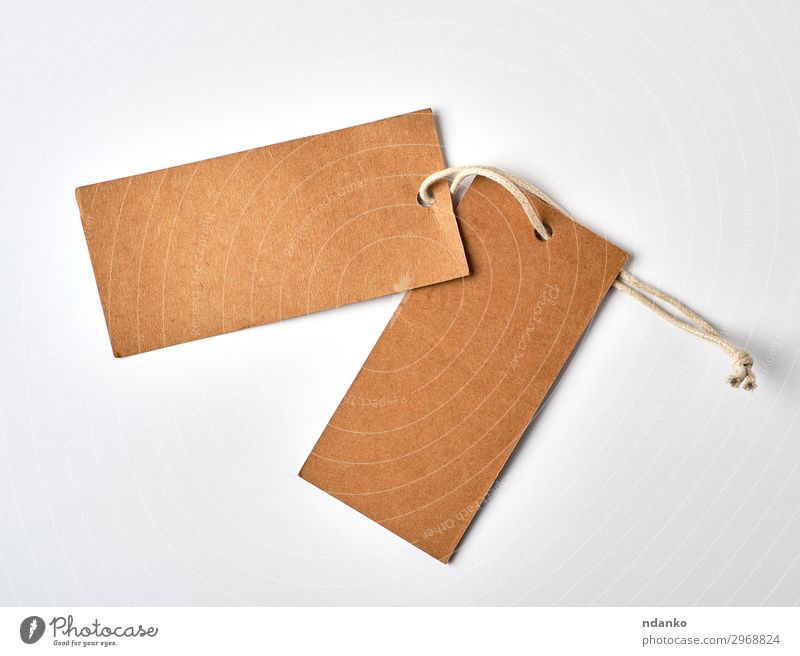 empty paper brown tag on the rope Craft (trade) Rope Paper Hang Sell Natural Brown White Idea conceptual background Blank buy Card Cardboard Gift kraft label