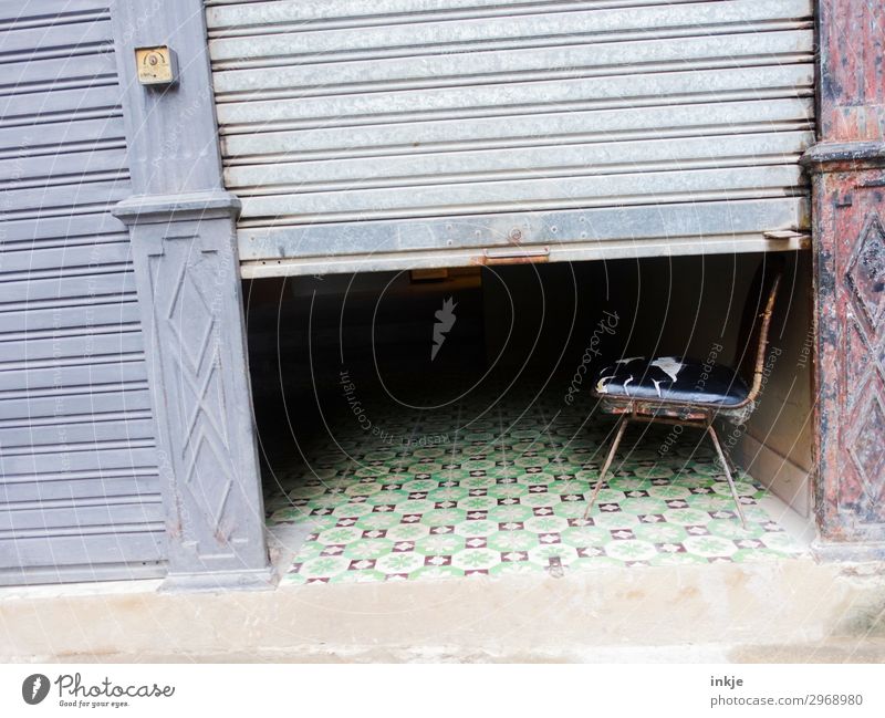 Cuban hairdresser (lunchtime) Deserted Facade Main gate Entrance Gate Garage door Slat blinds Chair Old Poverty Authentic Simple Broken Worn out Half Dark