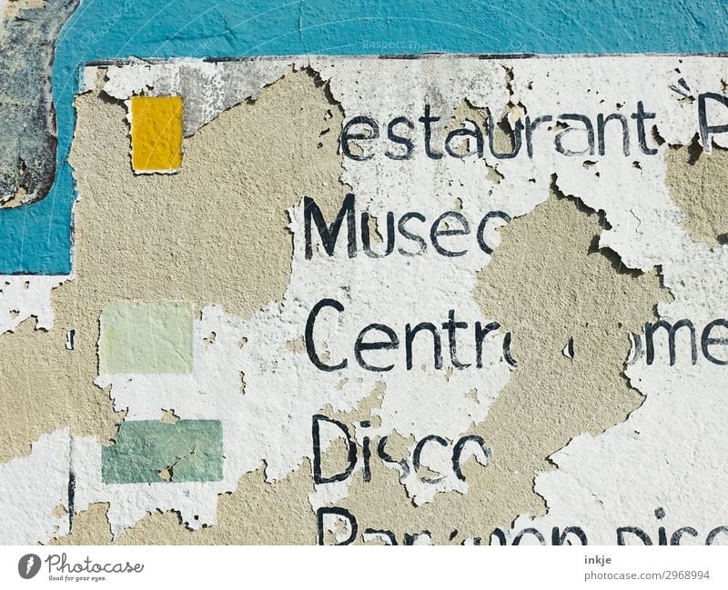 Cuban information sign Deserted Facade Stone Concrete Characters Signs and labeling Old Broken Tourism Decline Transience Weathered Flaked off Colour photo