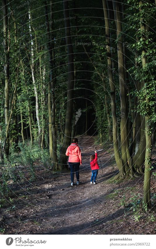 Mother with her little daughter walking through the forest Lifestyle Joy Beautiful Relaxation Leisure and hobbies Vacation & Travel Summer Hiking Child Woman