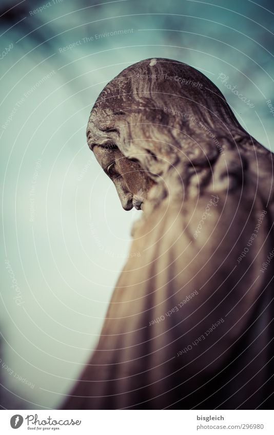 Christ figure Sculpture Stone Brown Green Sadness Grief Death Religion and faith Jesus Christ Statue Cemetery Colour photo Subdued colour Exterior shot Deserted