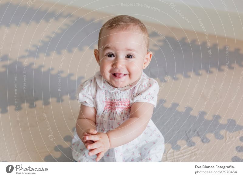 portrait of a beautiful baby girl at home. Family concept indoor Lifestyle Joy Happy Beautiful Face House (Residential Structure) Child Human being Feminine