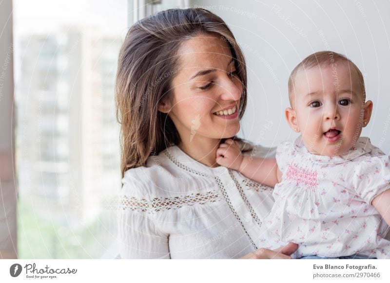 portrait of a beautiful baby girl and her mother at home Lifestyle Joy Happy Beautiful Face Playing Living or residing Flat (apartment)