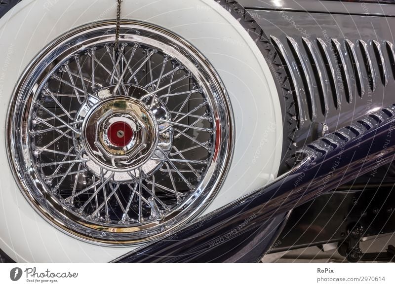 Spare wheel of a classic car. Lifestyle Luxury Elegant Style Leisure and hobbies Motorsports Work and employment Workplace Industry Art Work of art Transport