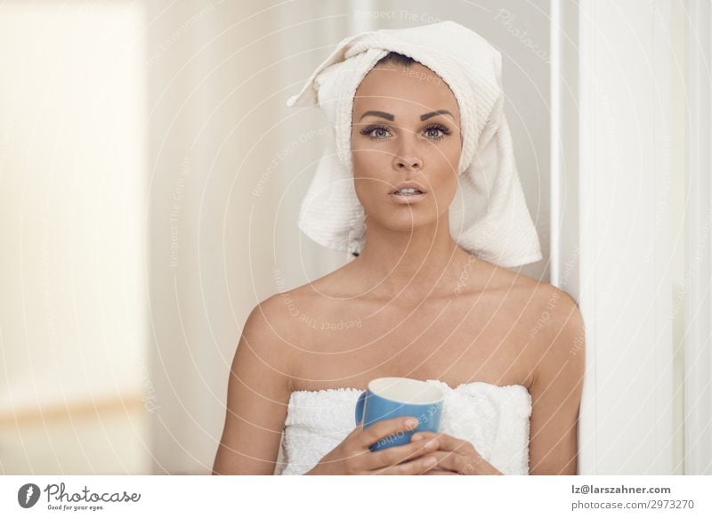 Pretty middle-aged woman wrapped in white towels Beverage Coffee Tea Beautiful Body Skin Face Medical treatment Spa Feminine Woman Adults 1 Human being