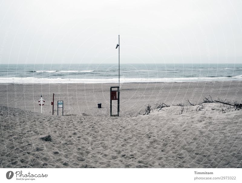 The day begins Vacation & Travel Beach Environment Nature Landscape Elements Sand Water North Sea Sign Signs and labeling Signage Warning sign Cold Blue Gray