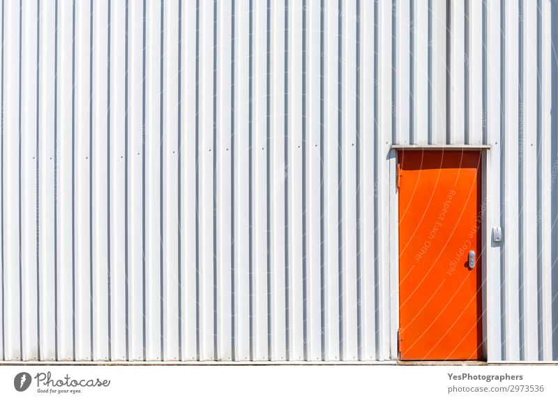 Orange metal door and a white warehouse wall Factory Industry Business Building Architecture Facade Metal Steel Modern White Access aluminum background closed