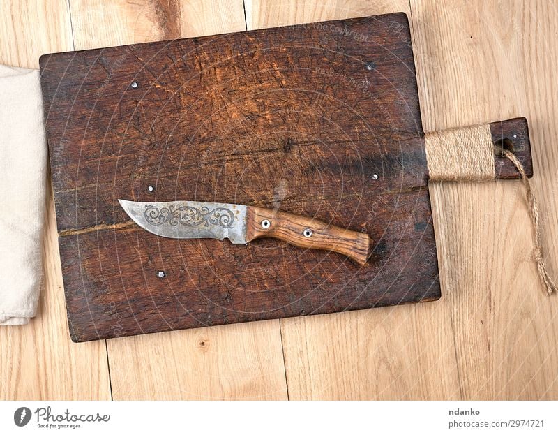 empty old wooden kitchen cutting board Knives Table Kitchen Tool Cloth Wood Metal Steel Old Above Retro Brown Yellow White blade Blank cooking Copy Space