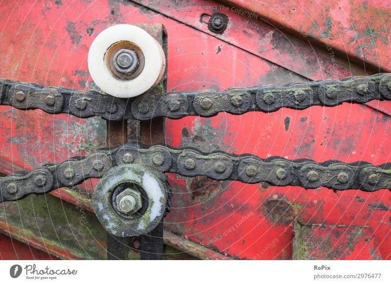 Chain guiding rolls on a agricultural machine. Leisure and hobbies Model-making Work and employment Profession Workplace Construction site Factory Economy