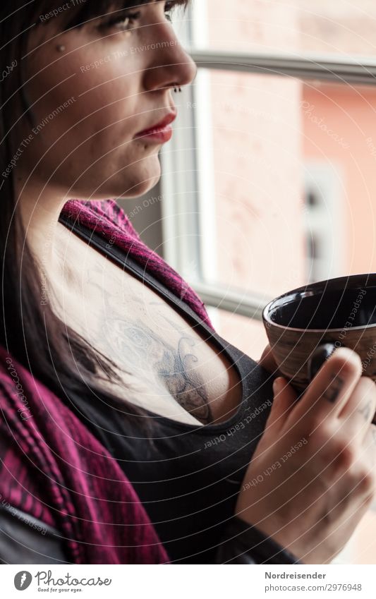 At the window Drinking Hot drink Coffee Tea Cup Senses Room Closing time Human being Feminine Young woman Youth (Young adults) 1 Window Tattoo Piercing Observe