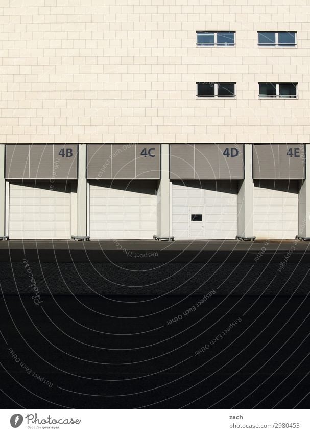 loading area Logistics Town Downtown Deserted Industrial plant Gate Wall (barrier) Wall (building) Facade Truck Digits and numbers Gray Load Delivery