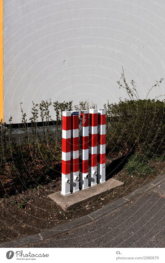 poller red white Plant Hedge Wall (barrier) Wall (building) Transport Traffic infrastructure Lanes & trails Barrier Bollard Gloomy Contentment Equal Protection