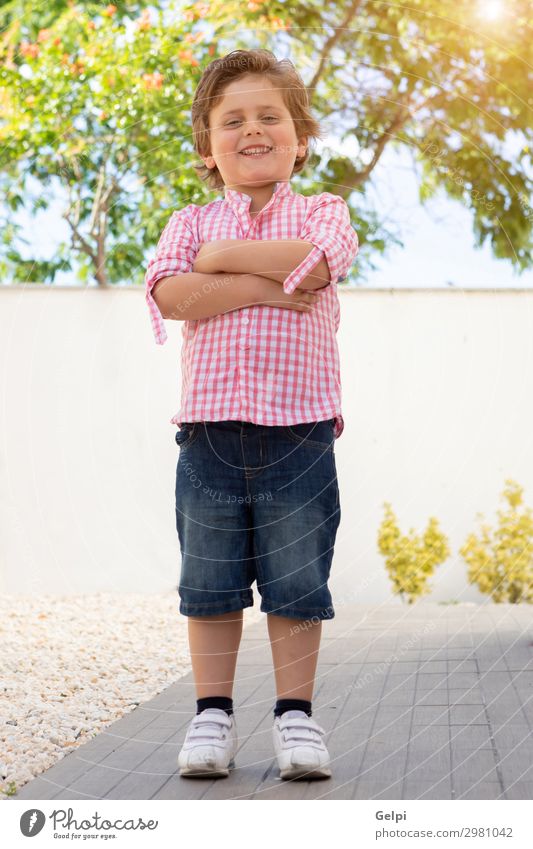 Happy child with pink shirt in the garden Joy Beautiful Summer Sun Garden Child Human being Baby Toddler Boy (child) Family & Relations Infancy Nature Grass