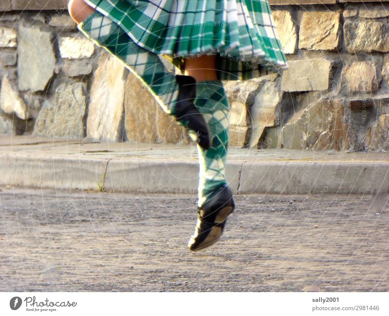 ...off the ground, dancing Scottish... Feminine Girl Legs Feet 1 Human being 8 - 13 years Child Infancy Street Skirt Sock Dance Movement Elegant