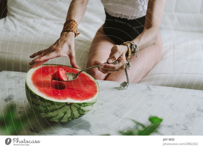beautiful woman eating watermelon indoor Fruit Nutrition Eating Lunch Spoon Lifestyle Happy Beautiful Summer Human being Feminine Woman Adults Body Hand Legs 1