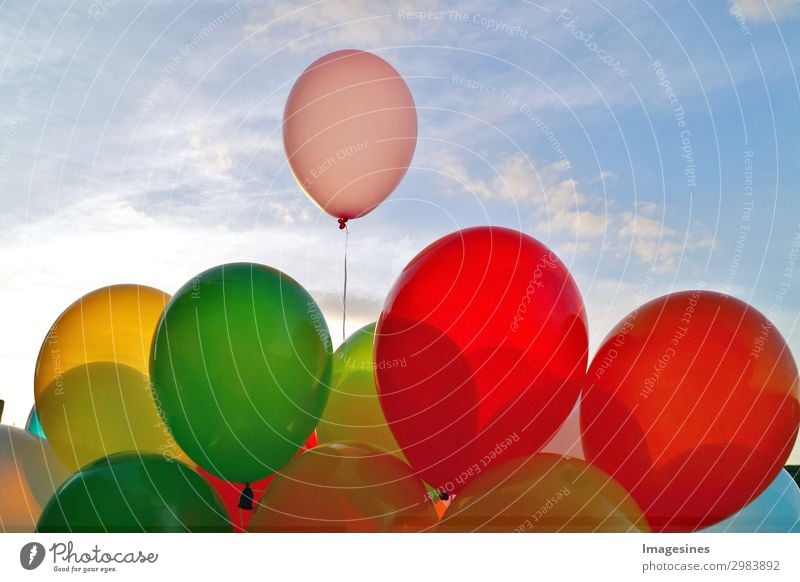 A Mixture Of Colourful Balloons Over A Blue Sky A Royalty Free Stock Photo From Photocase