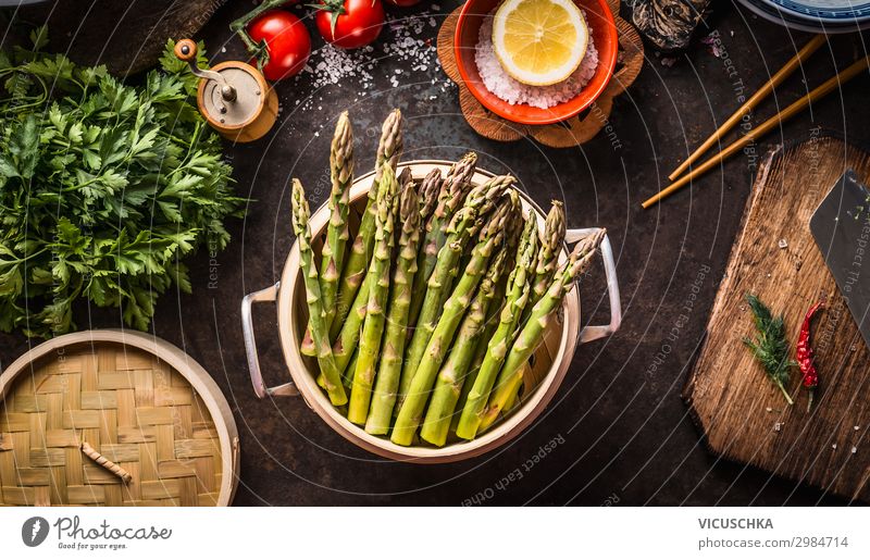 Cooking green asparagus Food Vegetable Nutrition Organic produce Vegetarian diet Diet Crockery Pot Style Healthy Eating Living or residing Restaurant Design
