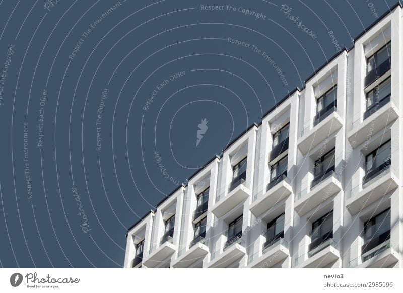 Rising Town Capital city Downtown Outskirts House (Residential Structure) High-rise Wall (barrier) Wall (building) Facade Blue White Manmade structures