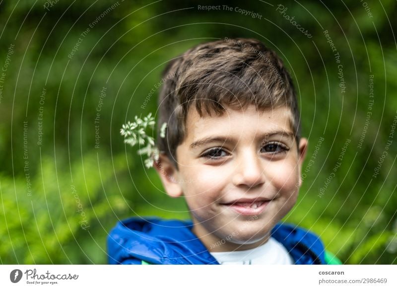 Beautiful boy with flowers in his ears Lifestyle Joy Happy Harmonious Vacation & Travel Tourism Trip Summer Hiking Child School Human being Toddler Boy (child)
