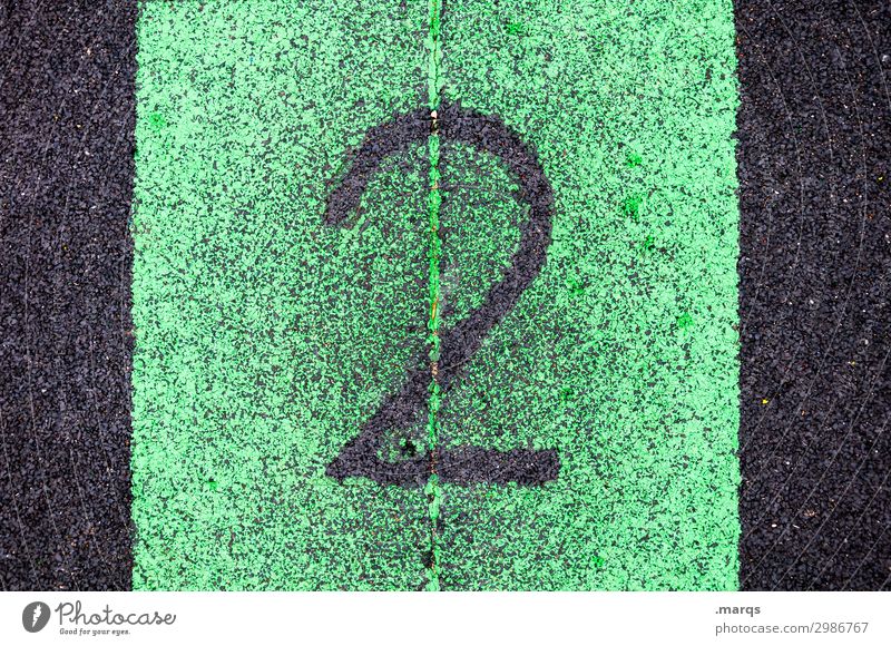 2 Success Sporting Complex Sporting event Plastic Digits and numbers Authentic Green Black Numbers Colour photo Exterior shot Close-up Structures and shapes