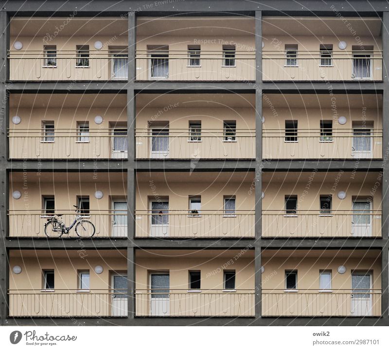 safe-deposit boxes Town Populated House (Residential Structure) High-rise Wall (barrier) Wall (building) Facade Window Door Bicycle Sharp-edged Simple Above