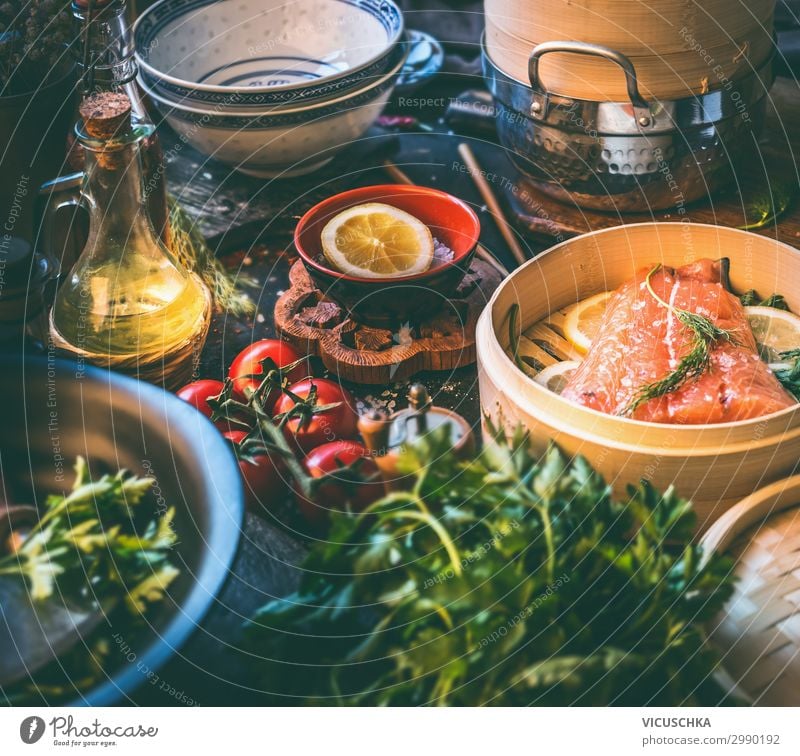 Salmon fillet in bamboo - steamer on kitchen table Food Fish Nutrition Lunch Organic produce Diet Crockery Design Healthy Eating Living or residing Table