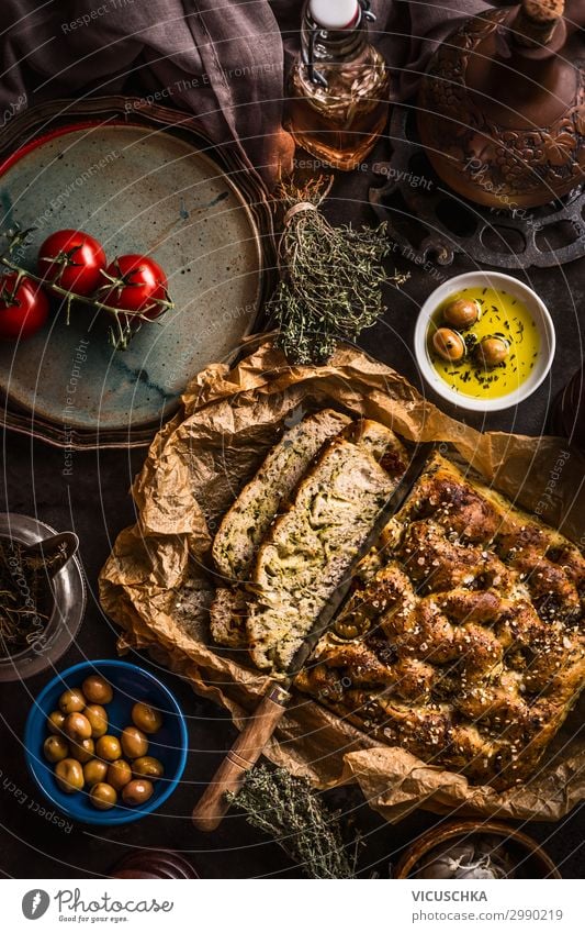 Focaccia bread with knife and olive oil Food Bread Herbs and spices Cooking oil Nutrition Lunch Italian Food Crockery Design Living or residing Restaurant Snack