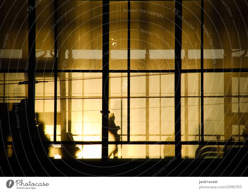 Alexanderplatz station in the evening sun, travelers waiting behind the glass front Downtown Berlin Station hall Line Warmth Symmetry Abstract Evening Shadow