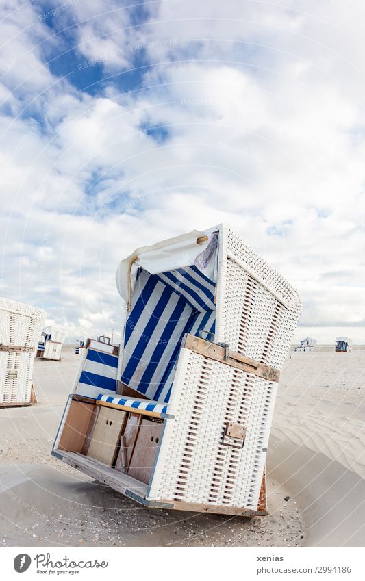 White beach chair with blue stripes on beach under clouds in nice weather Vacation & Travel Tourism Summer Summer vacation Sunbathing Beach Landscape Sky Clouds
