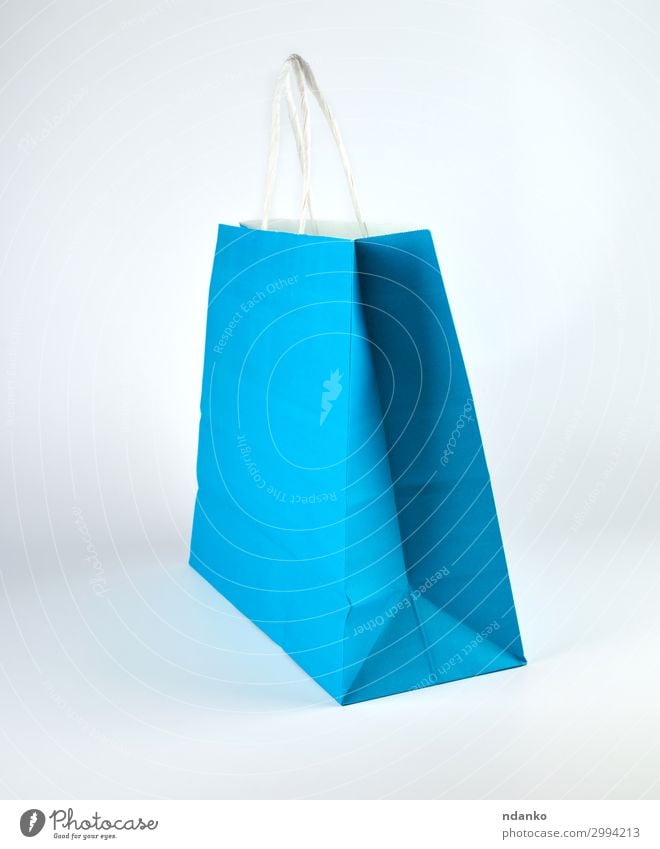 blue paper shopping bag with a handle Lifestyle Shopping Style Design Business Container Fashion Pack Paper Packaging Package Stand Modern New Blue White Colour