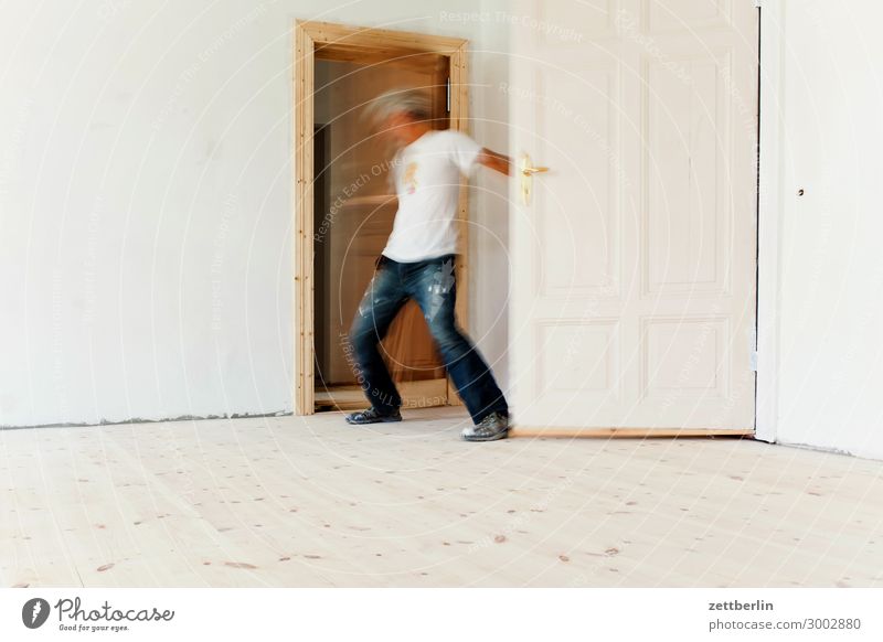 Close two doors Old building Work and employment Motion blur Hallway Wooden floor Floor covering Gentrification House (Residential Structure) Man Human being