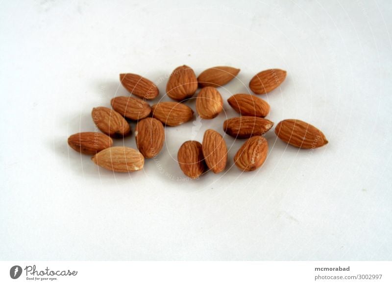 Almonds Food Nutrition Healthy Eating Wellness Good Brown almonds nuts energetic dry nutritious health healthy wholesome reduce cholesterol Horizontal dry fruit