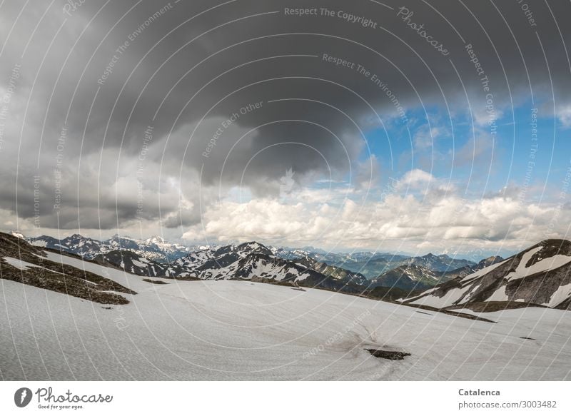 On the glacier, mountain range on the horizon, clouds wandering in the sky Nature Landscape Elements Sky Storm clouds Horizon Summer Weather Ice Frost Snow Rock