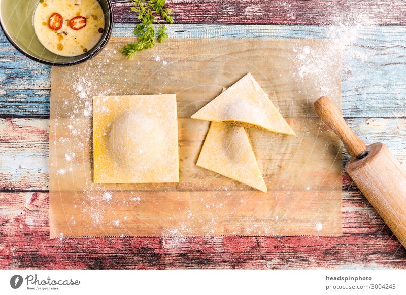 Homemade tortelloni on a colourful wooden table Food Dough Baked goods Nutrition Lunch Dinner Banquet Slow food Italian Food Feasts & Celebrations Delicious