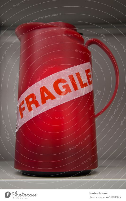 trapped in plastic | coffee in red thermos flask with sticker "FRAGILE Coffee Coffee pot Red Screen print fragile Reddish white Beverage Coffee break Breakfast