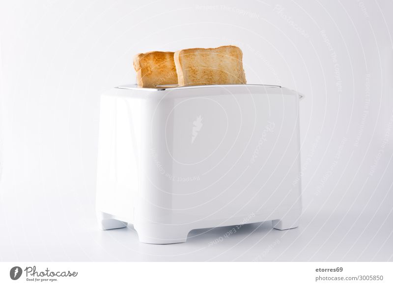 Toasted toast bread in white toaster isolated Bread Ready Toaster White Isolated (Position) Food Healthy Eating Food photograph Breakfast Sandwich Close-up