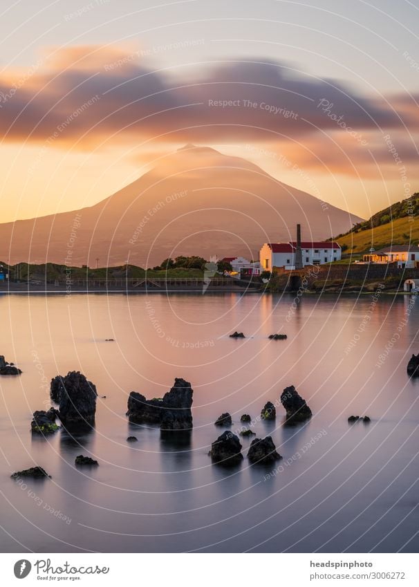 Volcano island Pico, Azores and the Atlantic Ocean at sunrise Vacation & Travel Tourism Far-off places Sightseeing Cruise Landscape Elements Clouds Coast