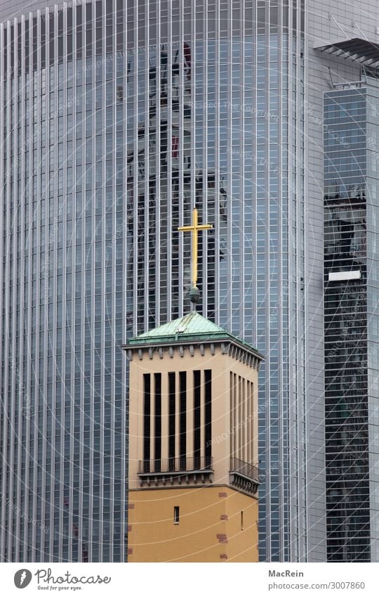 Church in a banking district Town Capital city Downtown High-rise Bank building Architecture Crucifix Religion and faith Church spire Christian cross