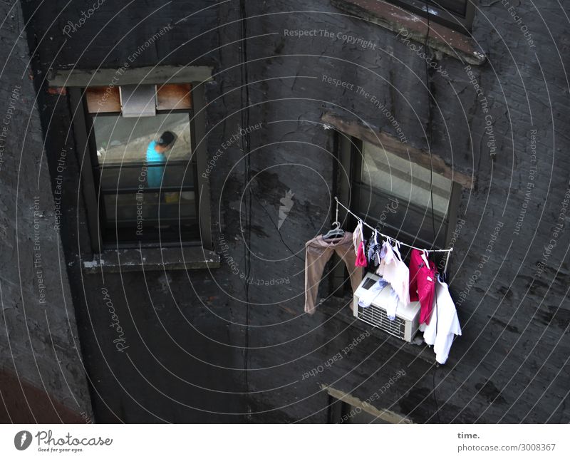 washing day Living or residing Flat (apartment) Room Laundry Clothesline Masculine Man Adults 1 Human being Wall (barrier) Wall (building) Ventilation Going