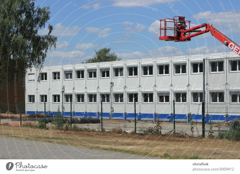 Office container on site Living or residing House (Residential Structure) Moving (to change residence) Room Economy Industry Construction site Wall (barrier)