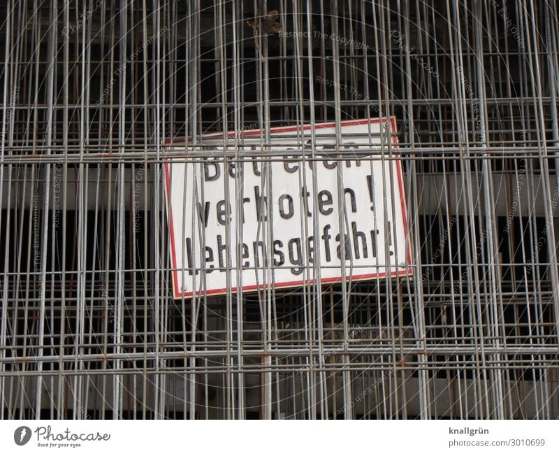 Trespassing forbidden! Hoarding Wire mesh Metalware Characters Signs and labeling Signage Warning sign Communicate Black Silver White Emotions Responsibility